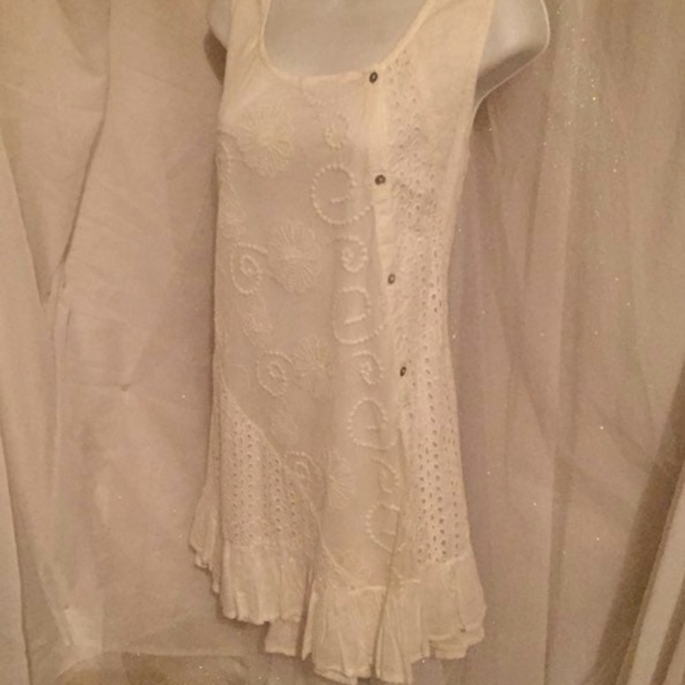 Eyelet & ruffles mini dress. New